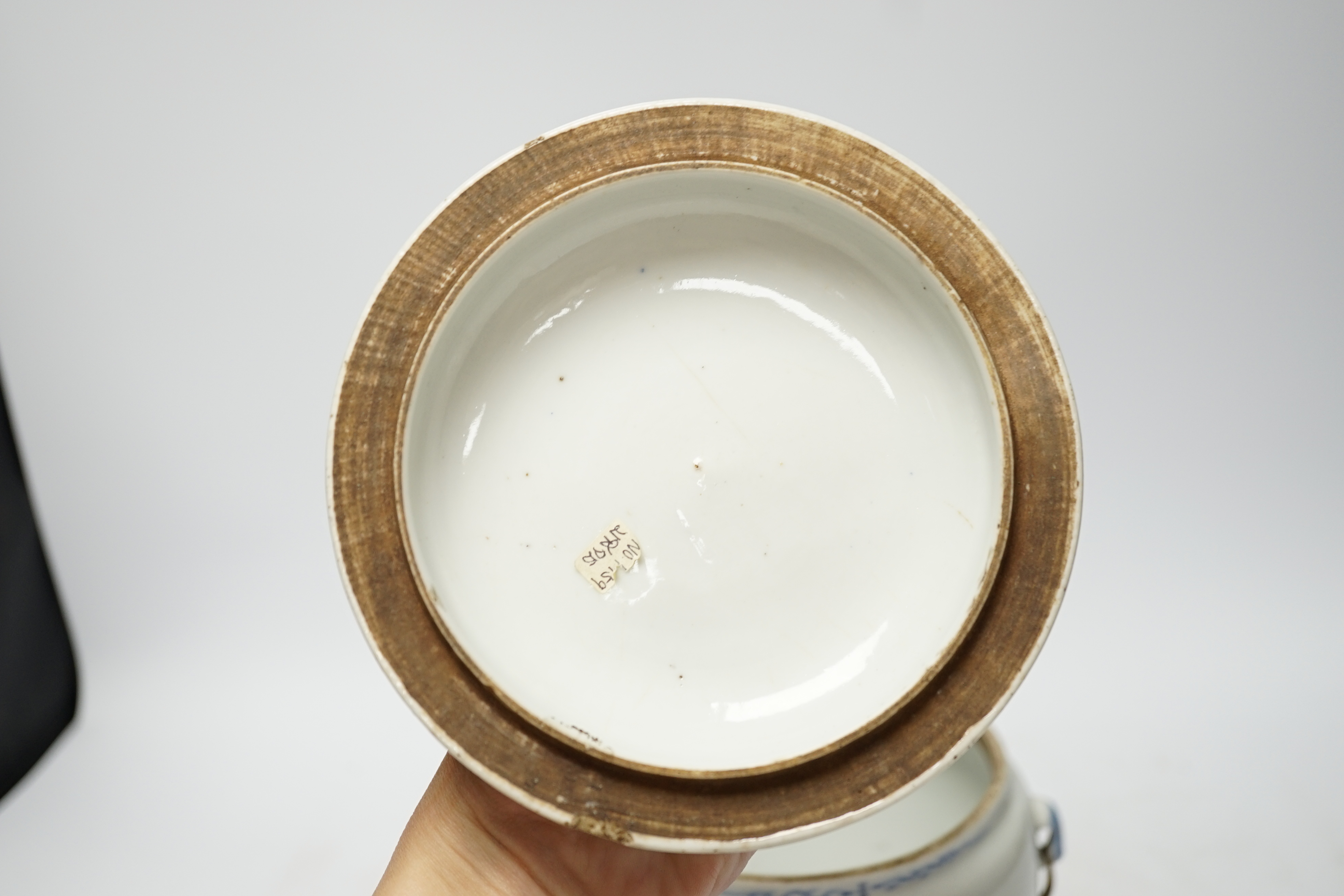 A Chinese Straits blue and white bowl and cover, kamcheng, late 19th century, with twin handles, on hardwood stand, 19cm high